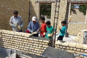 روزی که دیوارهای مدرسه را خودمان ساختیم